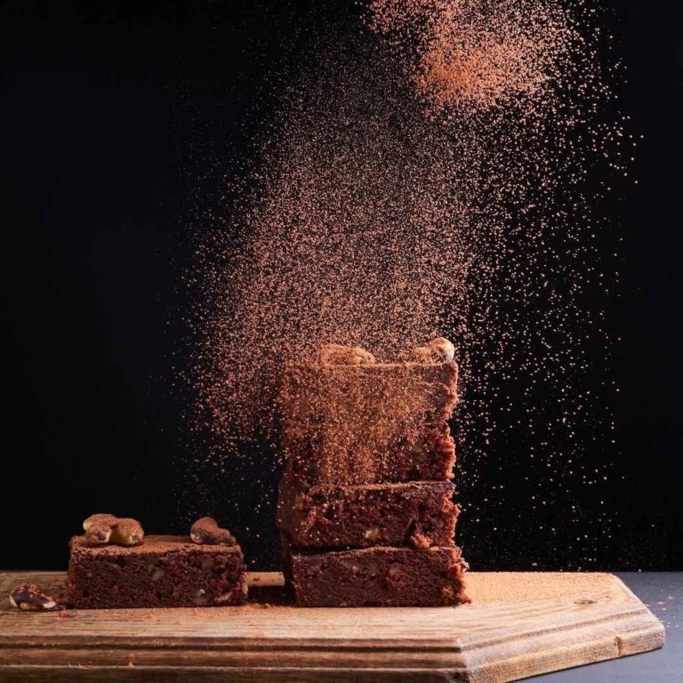 Callebaut Cocoa Powder dusting over chocolate brownies