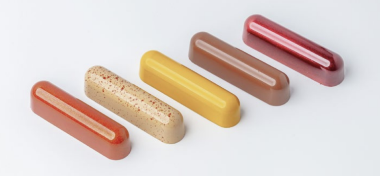 Moulded oblong chocolates with rounded ends in autumnal colours