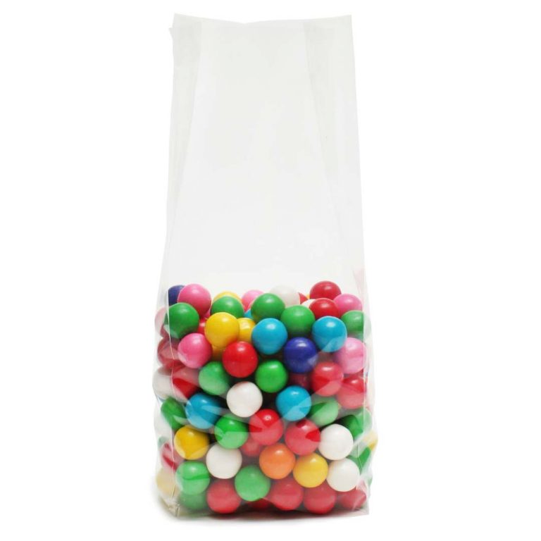 Clear Biodegradable Cellophane Bag filled with bright coloured smarties on white background