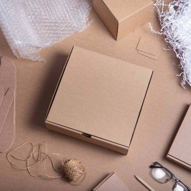 Brown postal box and packaging items for a chocolate business