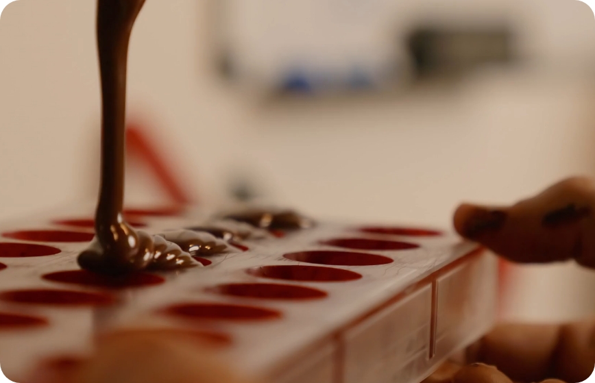 Chocolate being poured into moulds
