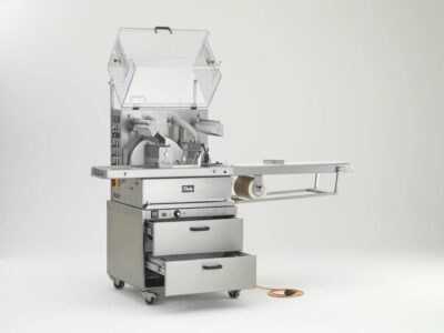 Chocolate enrober with tempering and 220mm wide enrobing belt on mobile trolley with 1m take off table and heating cabinet with two tanks